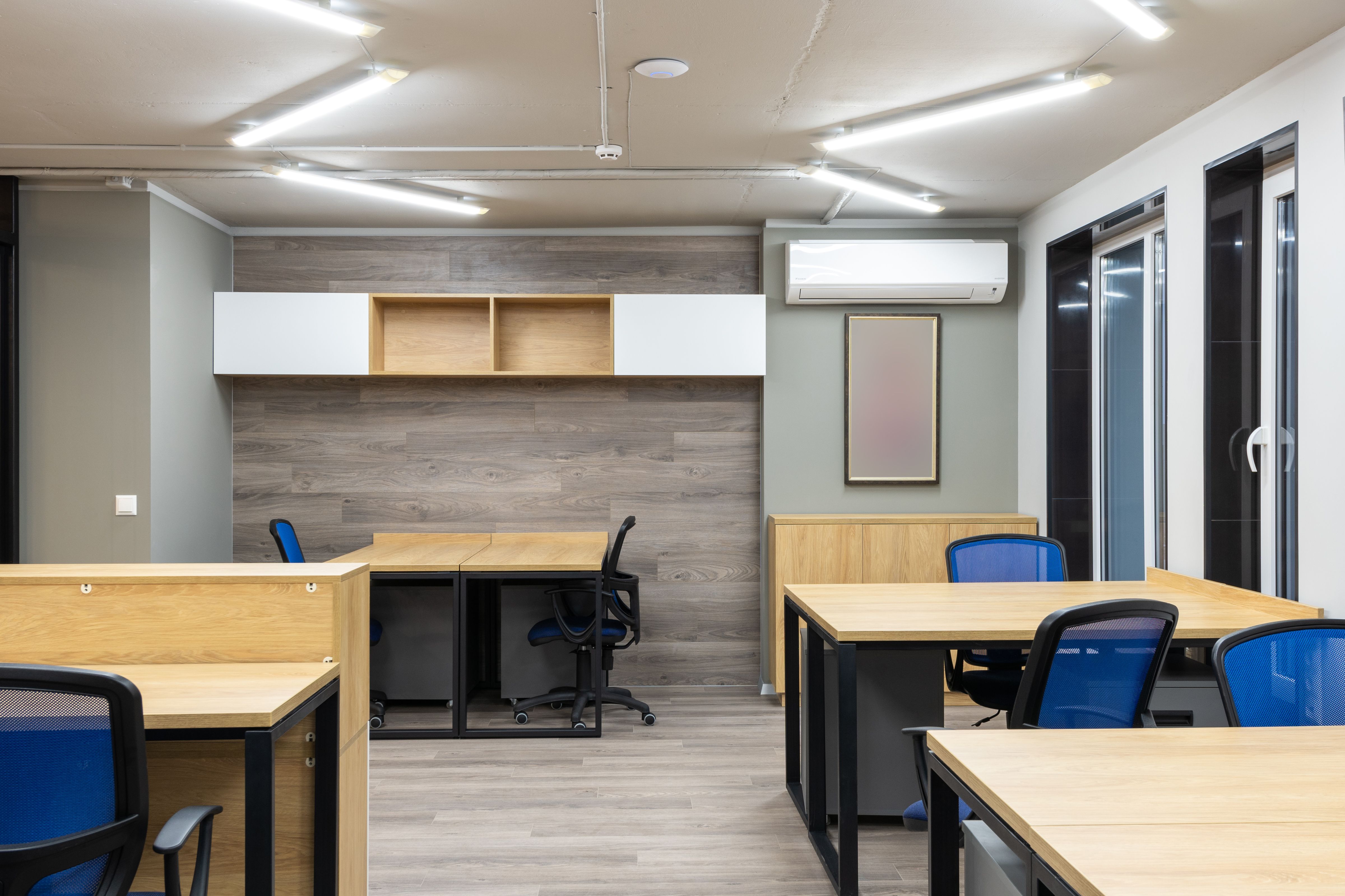 Spotless open-plan commercial office workspace with clean desks